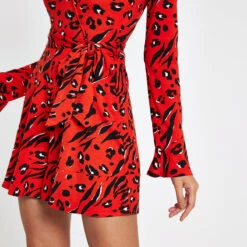 RIVER ISLAND -Red Animal Print Long Sleeve Playsuit - Drest -Pas Cher Mode Séduisante Magasin black skinny mid rise molly jeggings 729636 alt1 Product Page Zoom